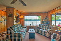 Lakefront Manistique Cabin w / Private DockFire Pit