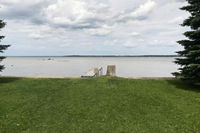 Prudenville Lakefront House with Yard  Private Dock