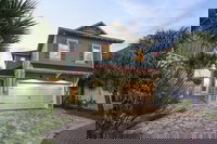 Don't Worry Beach Happy by Five Star Properties